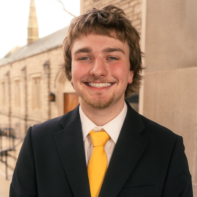 Headshot of Alex Cook